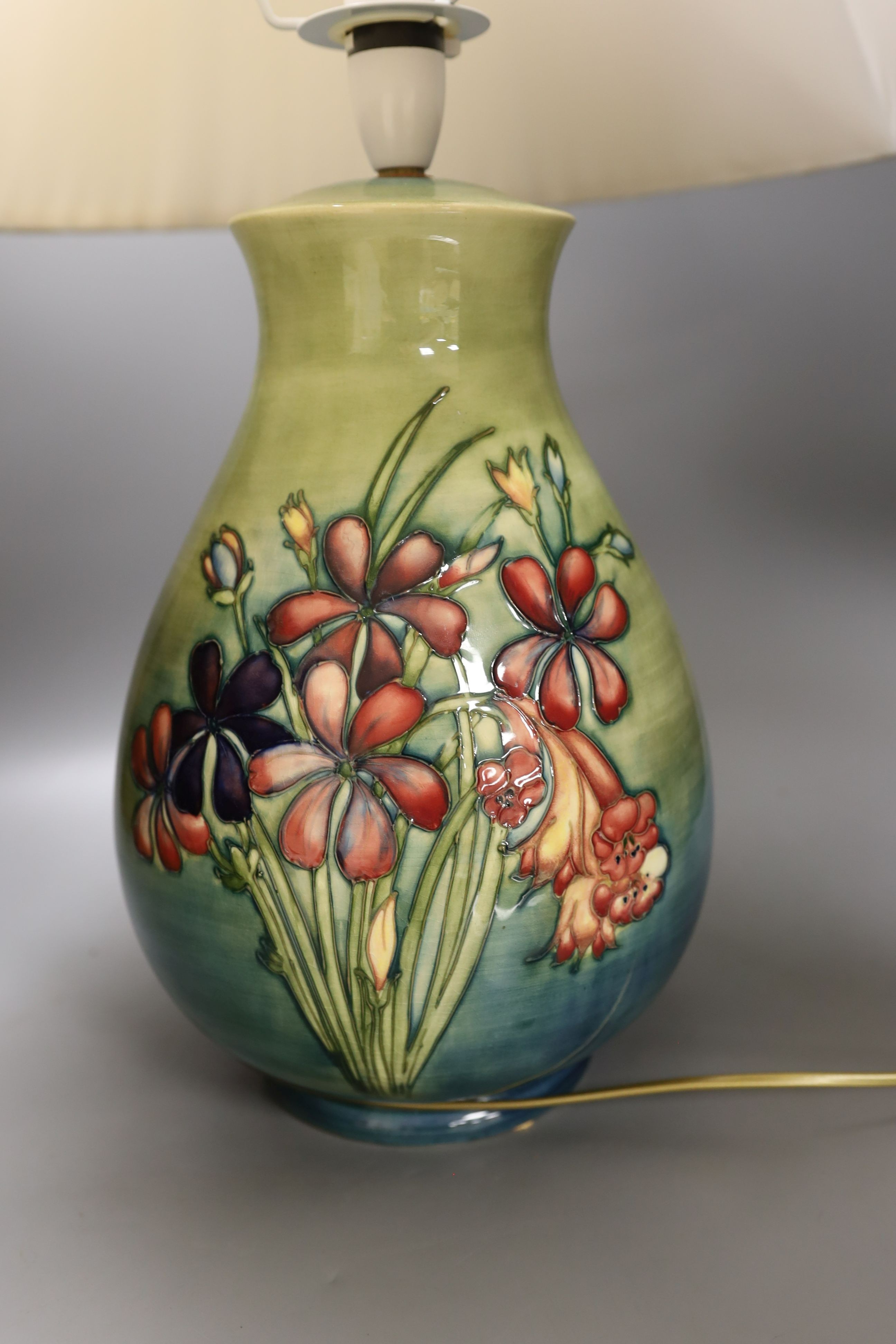 A large Moorcroft Spring Flowers table lamp base, 35 cms high.